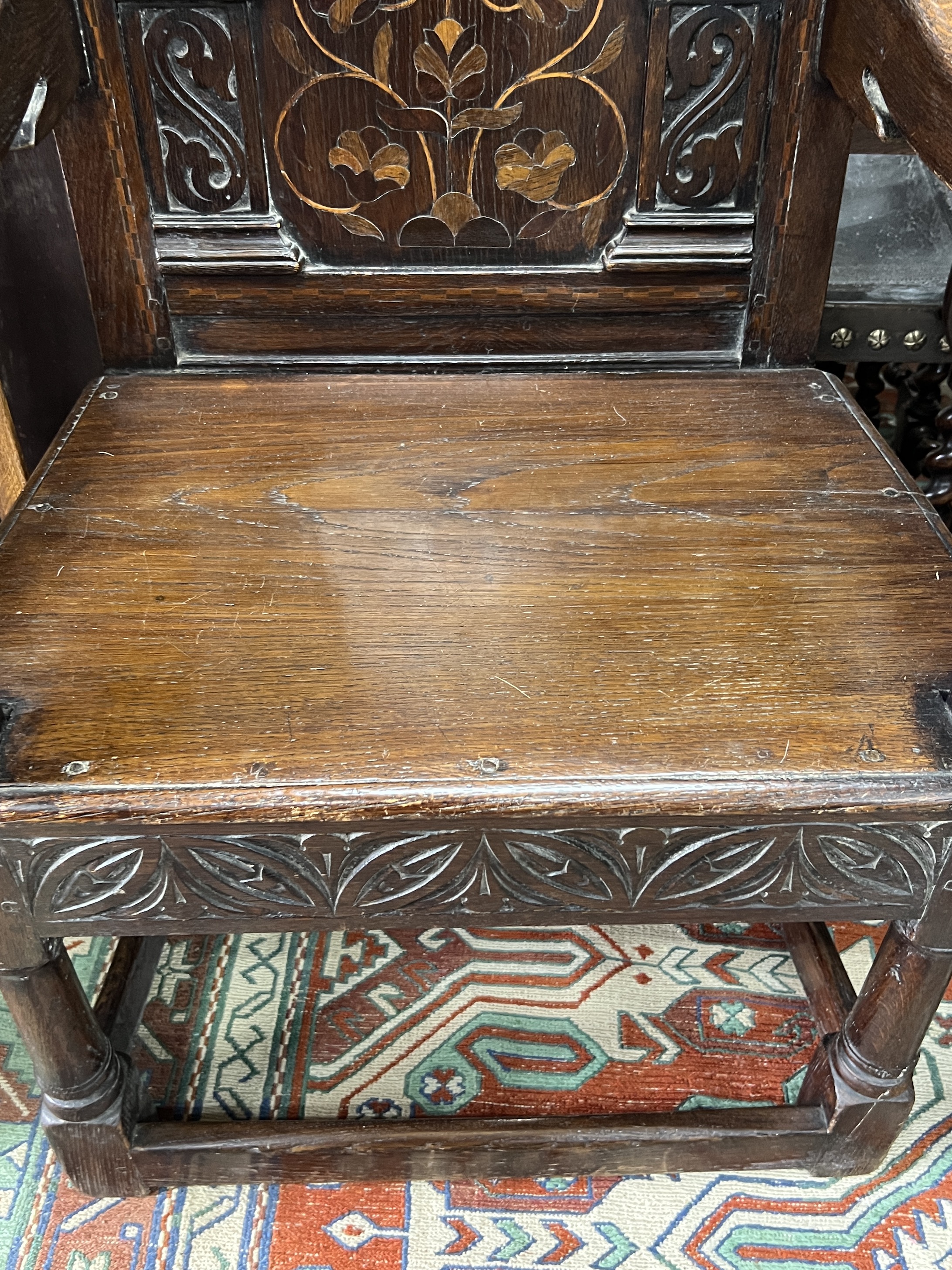 A 17th century style oak wainscot chair, width 58cm, depth 52cm, height 102cm